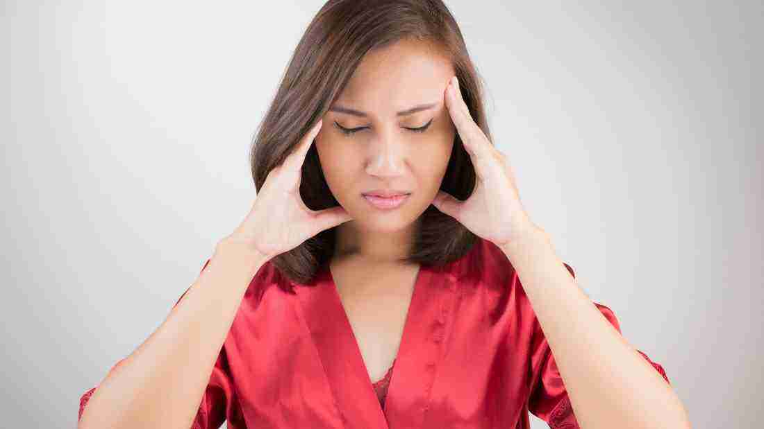 A woman who looks totally overwhelmed and confused