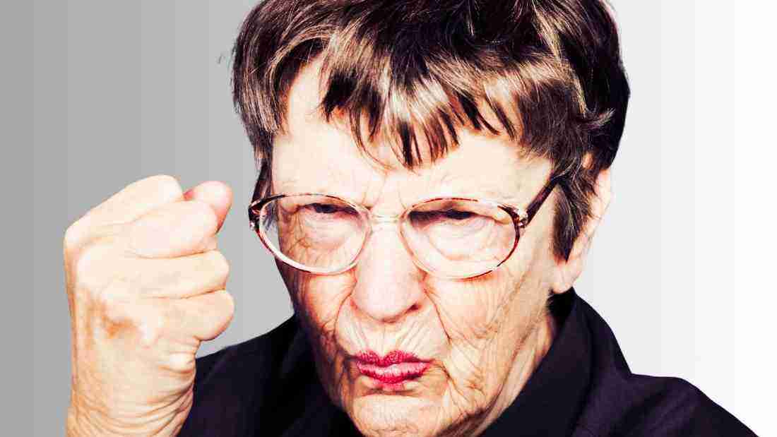 An old woman shaking her fist