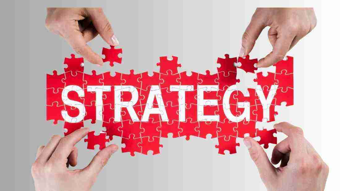 A jigsaw puzzle with the word STRATEGY