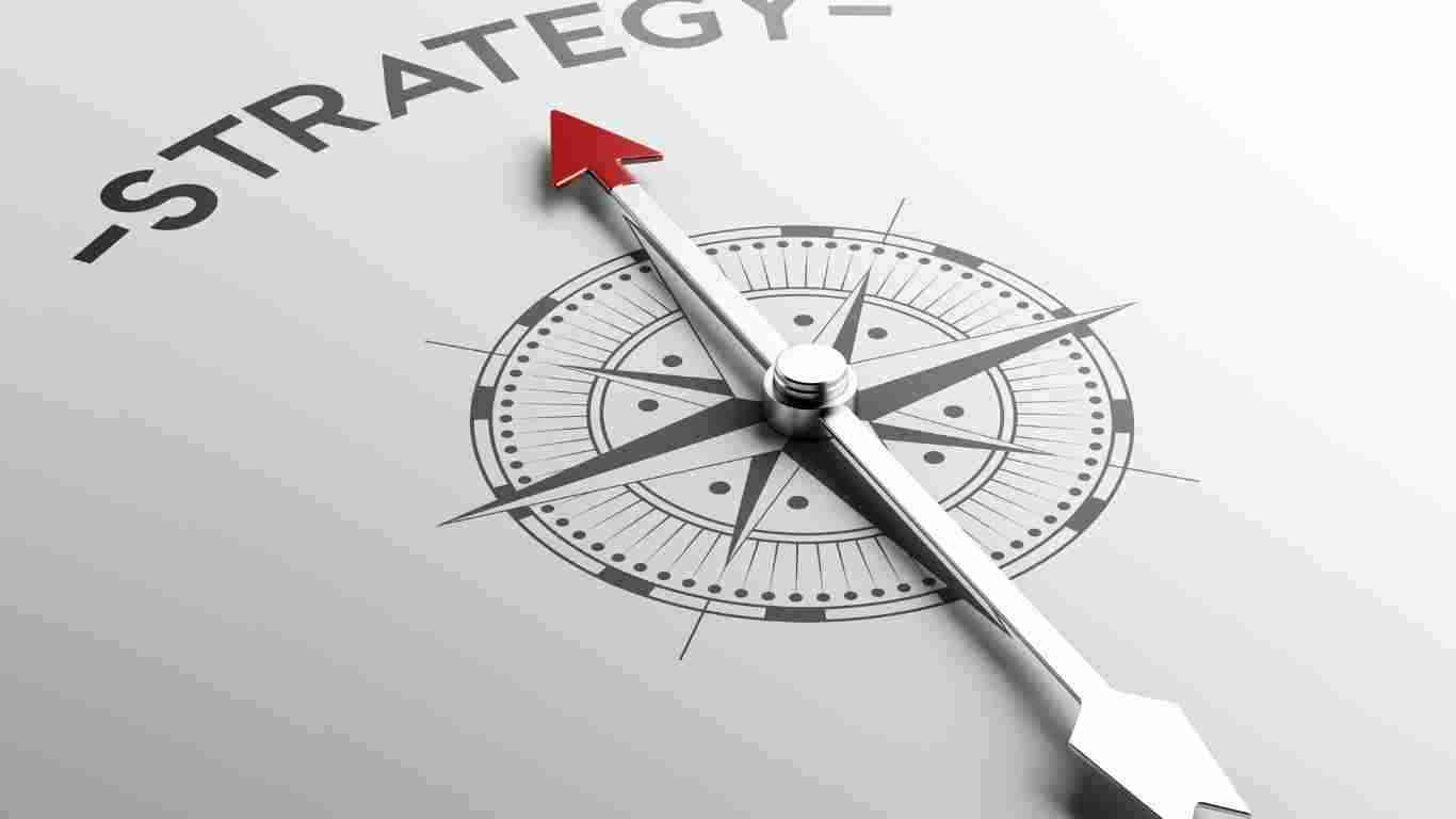 A compass pointing to the word STRATEGY