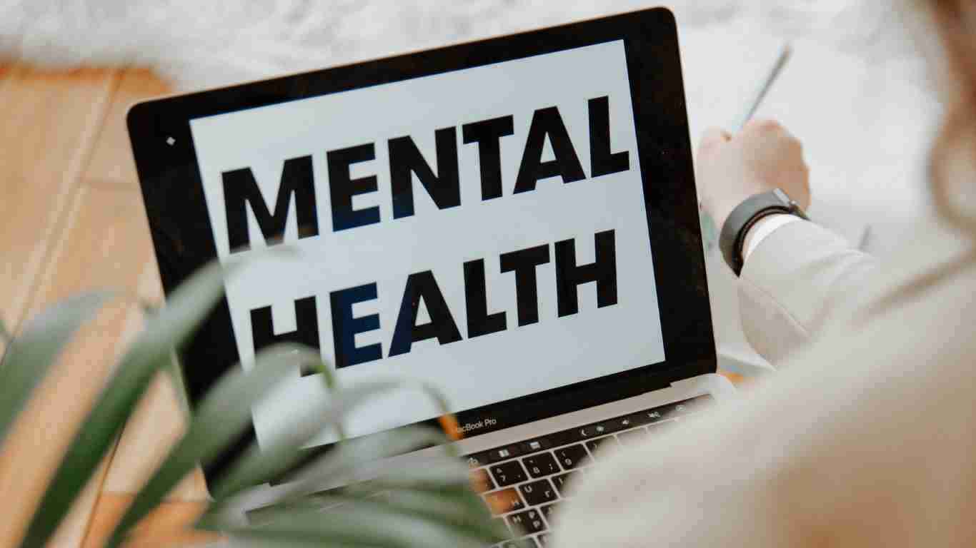 A large sign saying MENTAL HEALTH