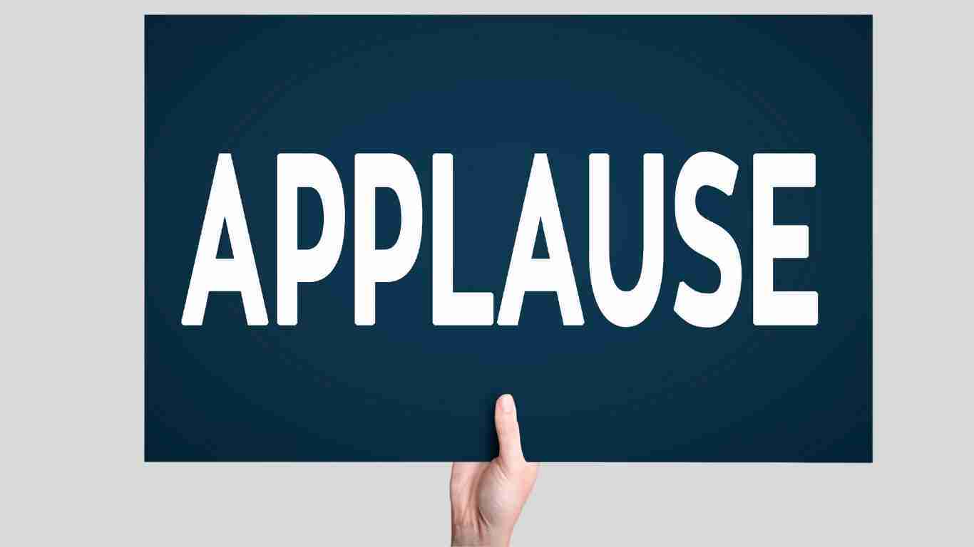 A sign saying APPLAUSE