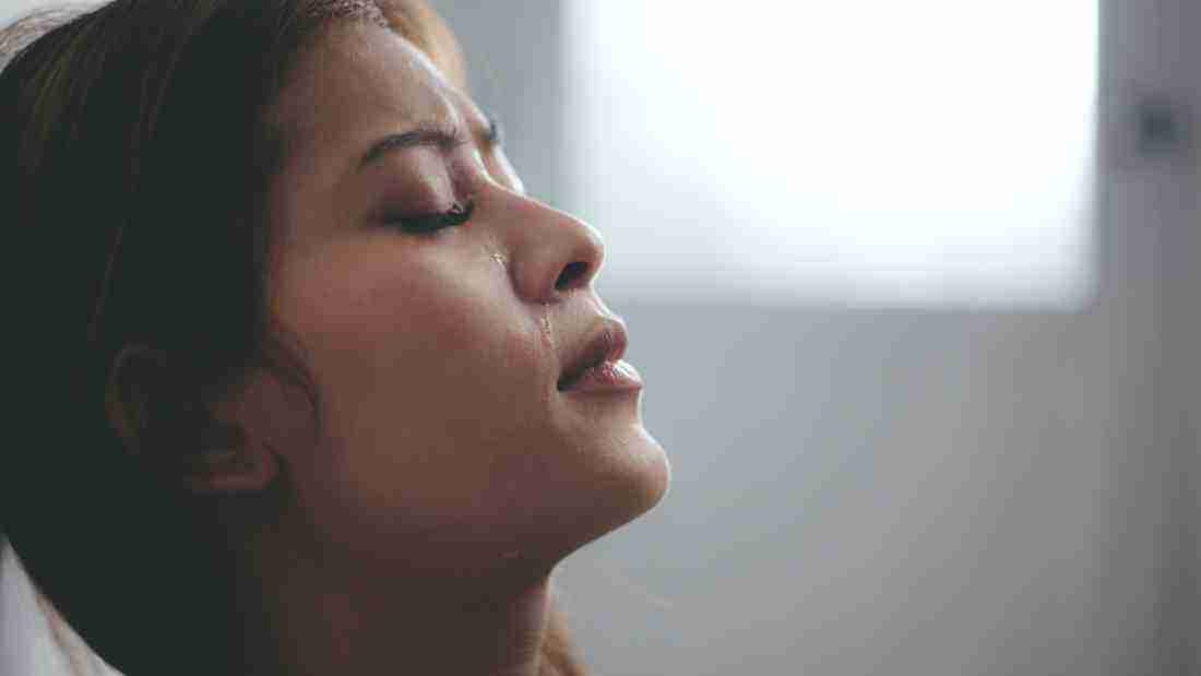 A distraught young woman
