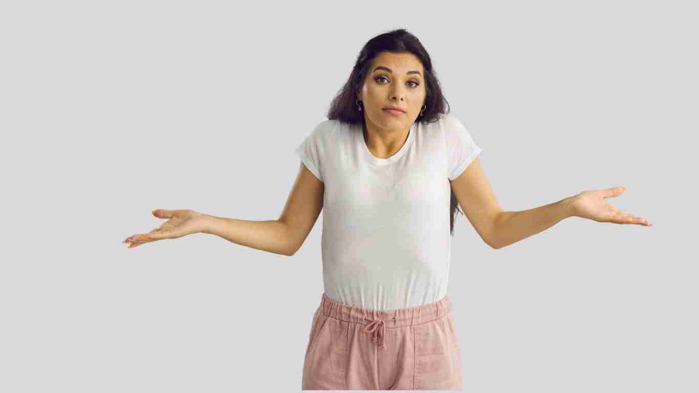 A woman shrugging that she has nothing to do with it