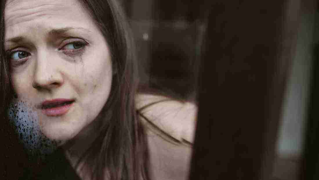 A very sad and anxious woman