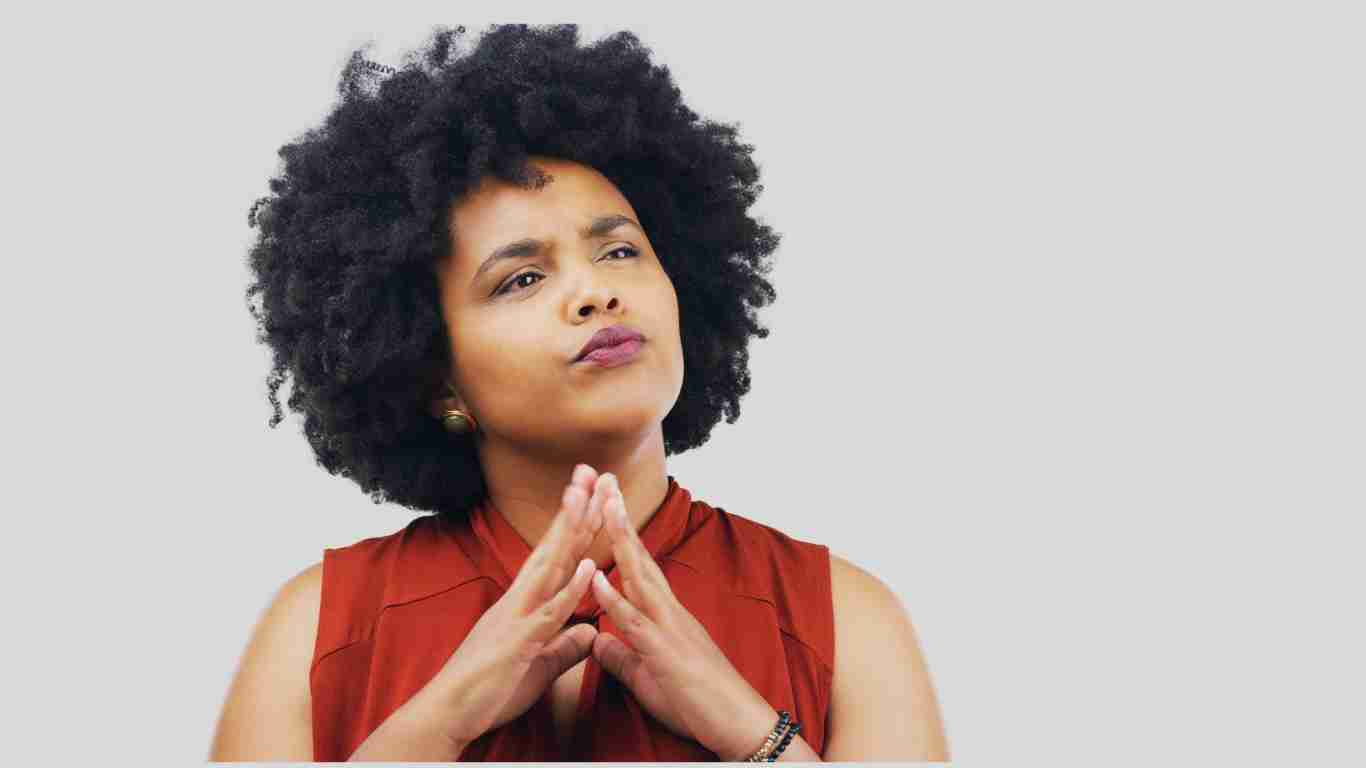 A woman with a pensive look on her face