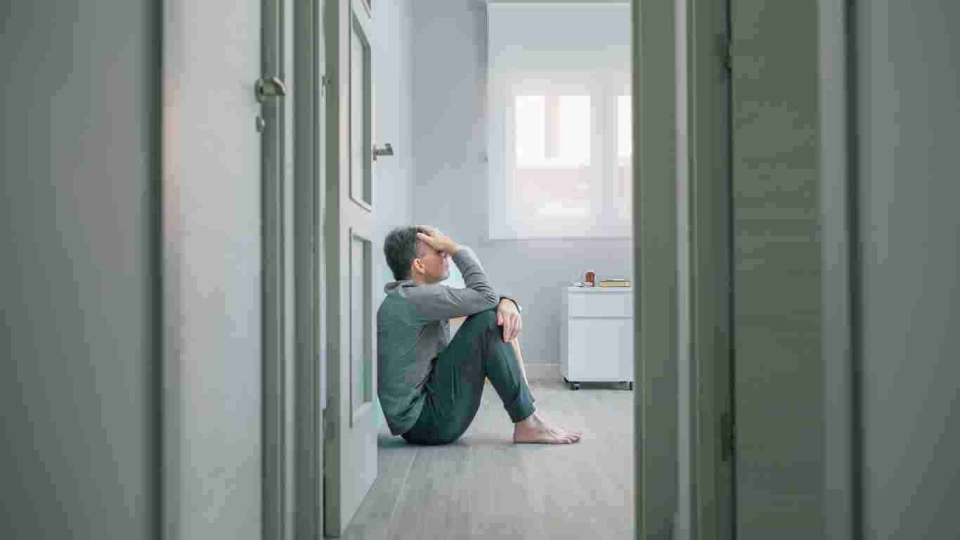 A man struggling with mental illness