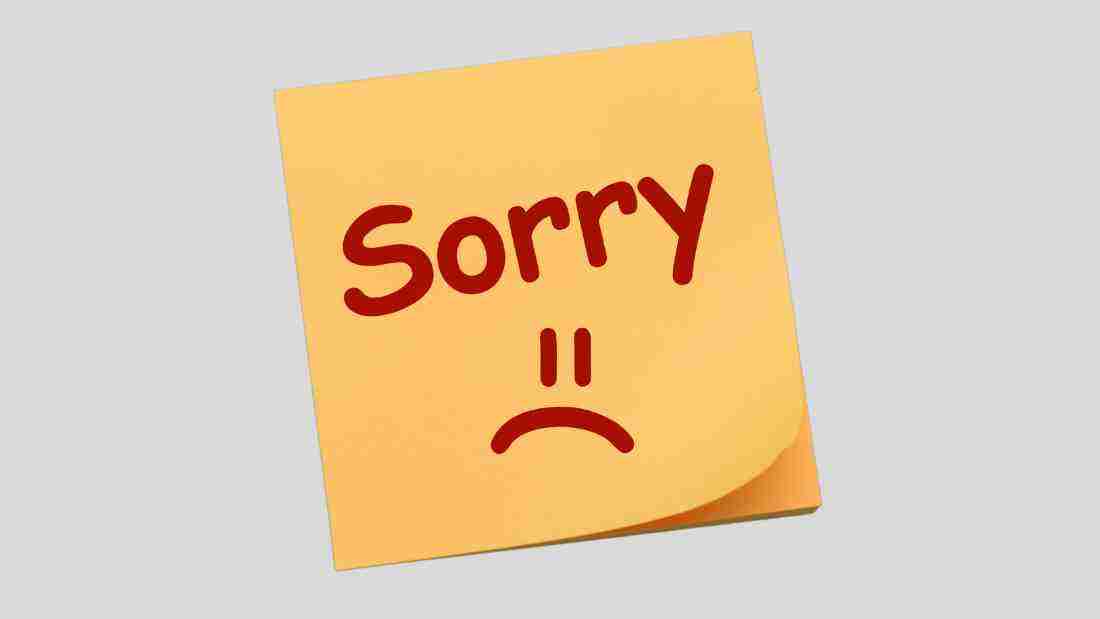 The word SORRY written on a post-it