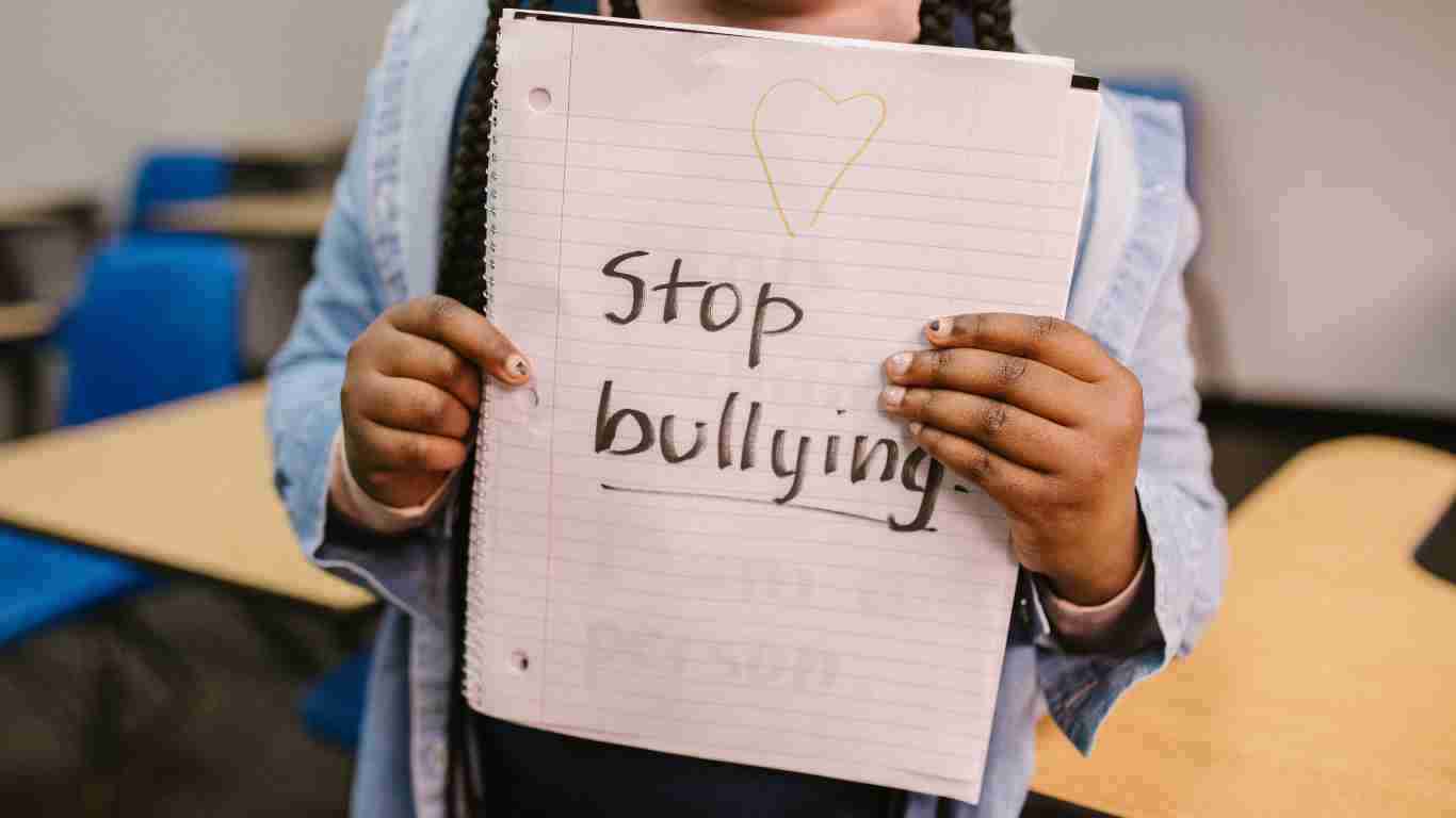 A sign that says STOP BULLYING