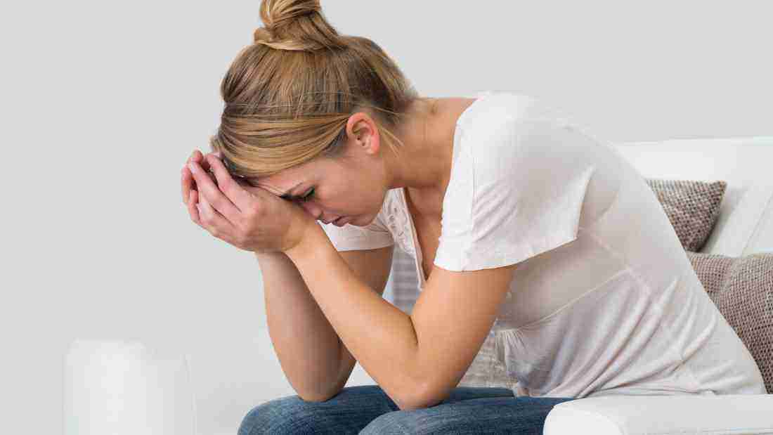 A woman who looks very stressed