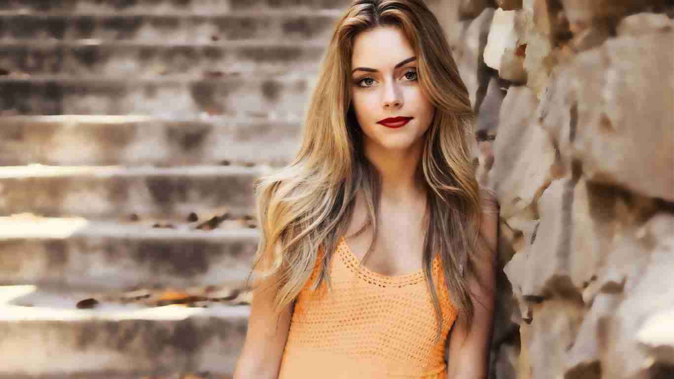 A pretty woman posing for a photo