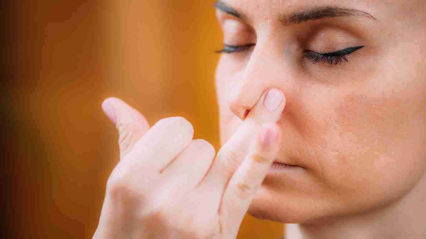 A woman controlling her anxiety using her breath
