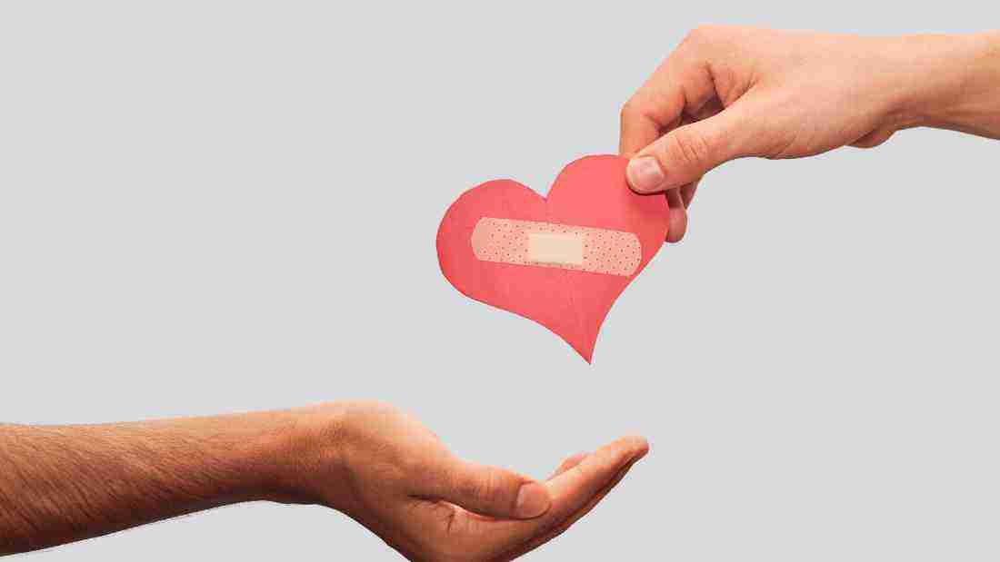 A man giving a healed heart to a woman