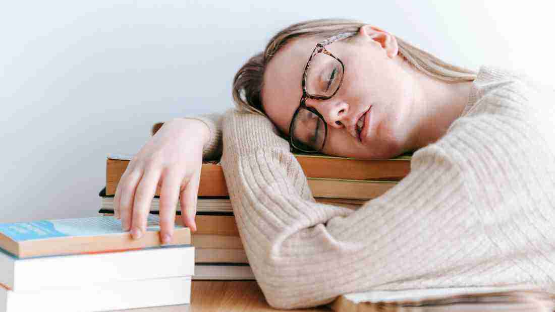 An exhausted young woman