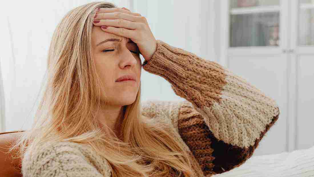 A woman who has a headache