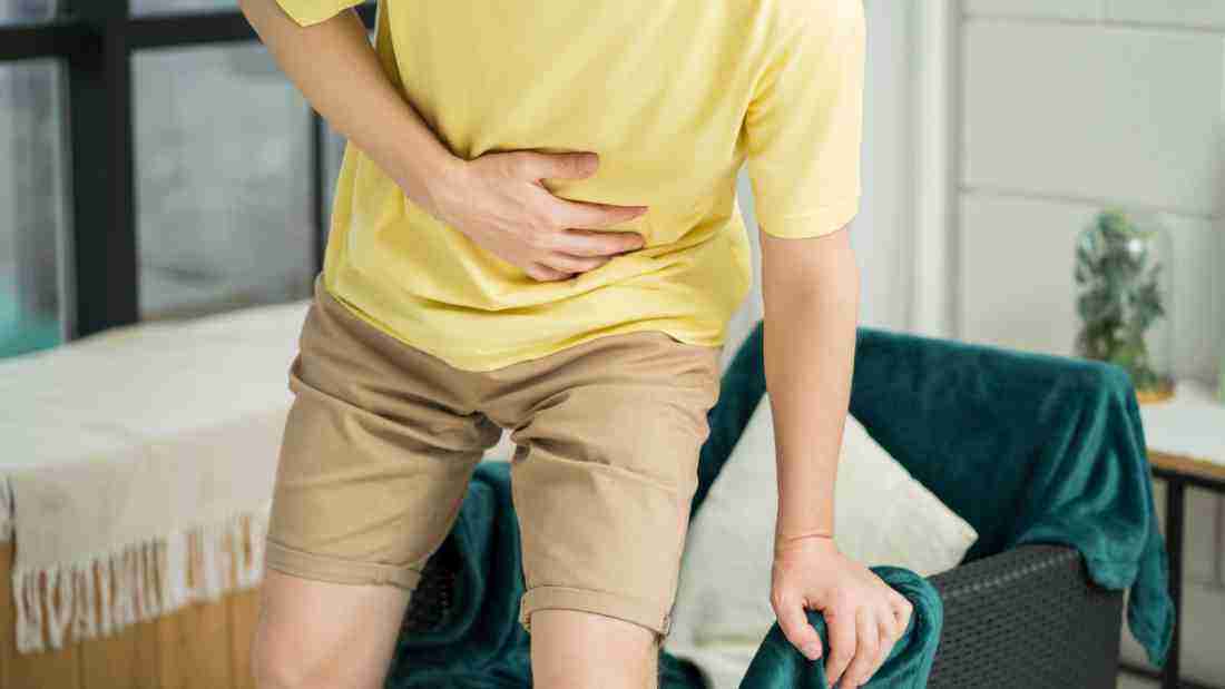 A man struggling with nausea