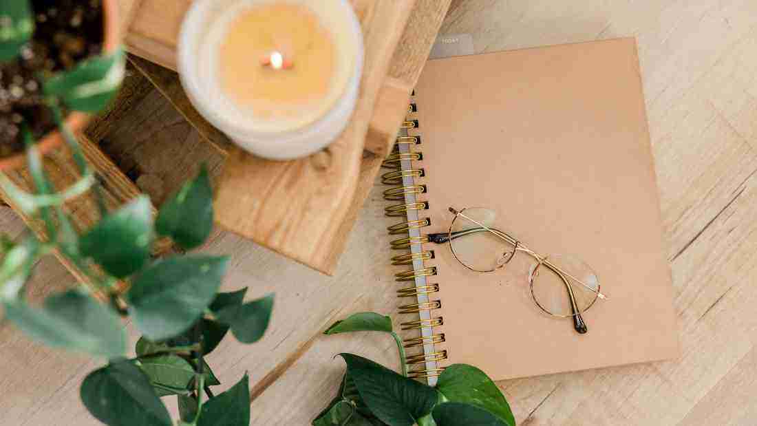 Candles and journaling - a calm and soothing ambiance