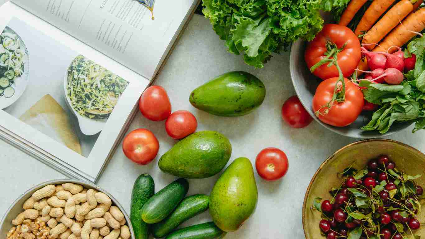 Healthy food - avocados, nuts, fruit and vegetables