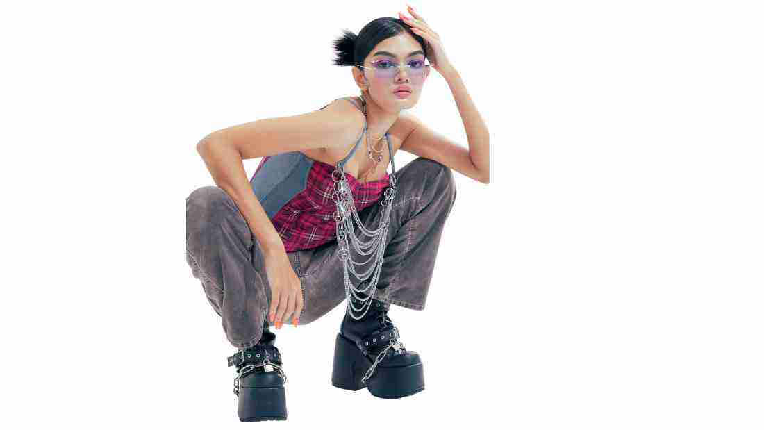 A young woman wearing a totally over the top outfit