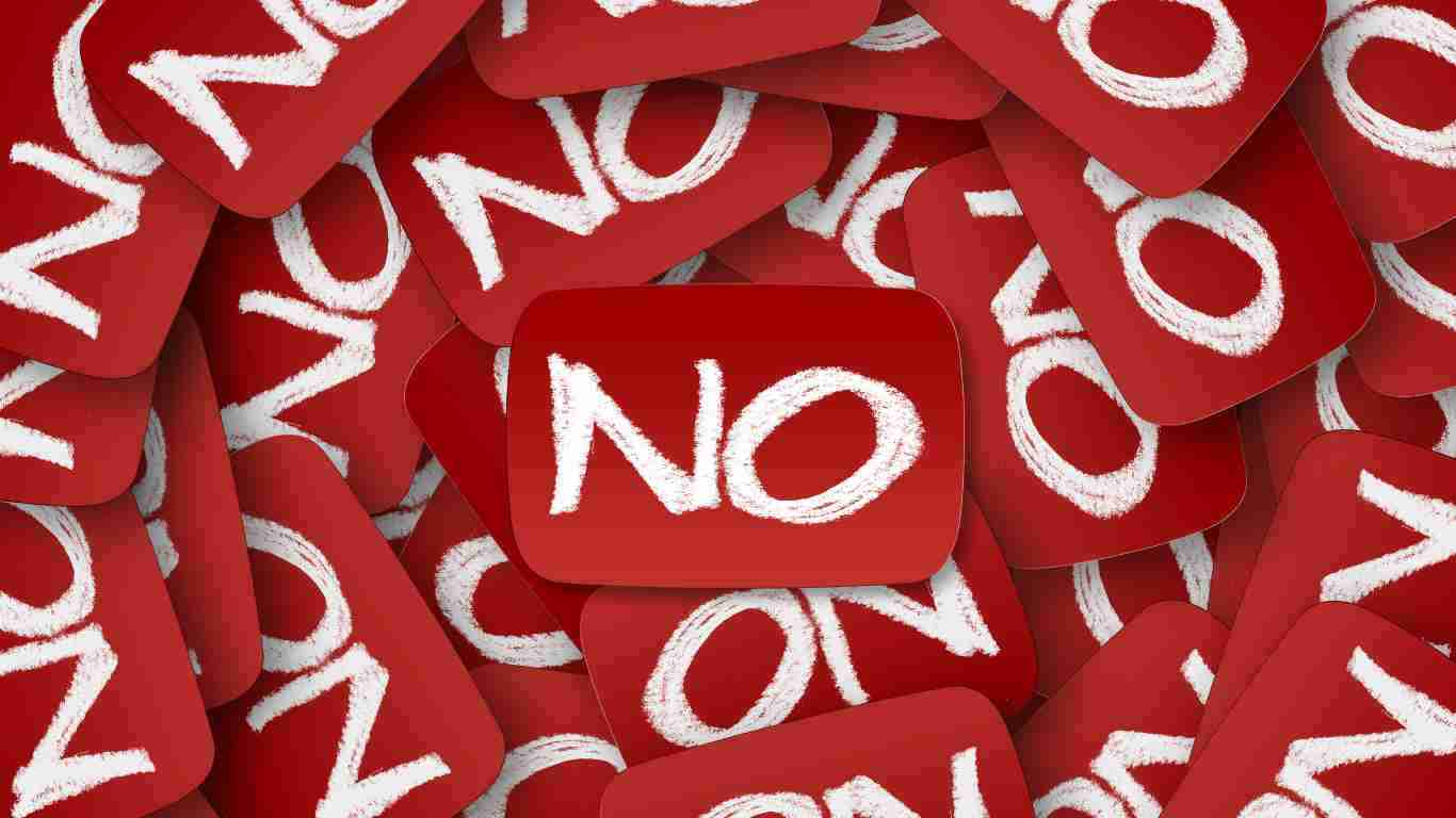 Many no signs in a pile