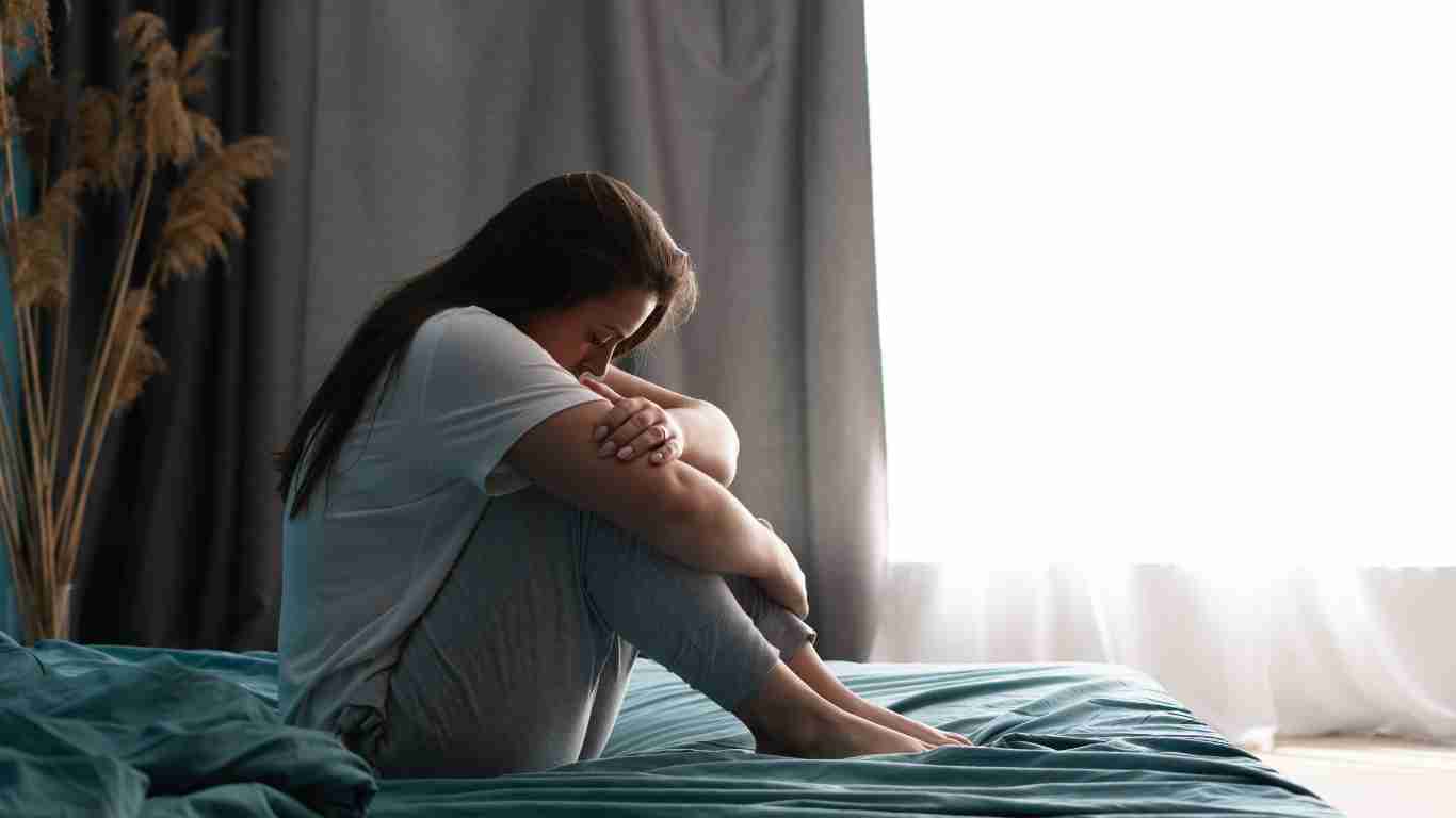 A woman struggling with mental illness