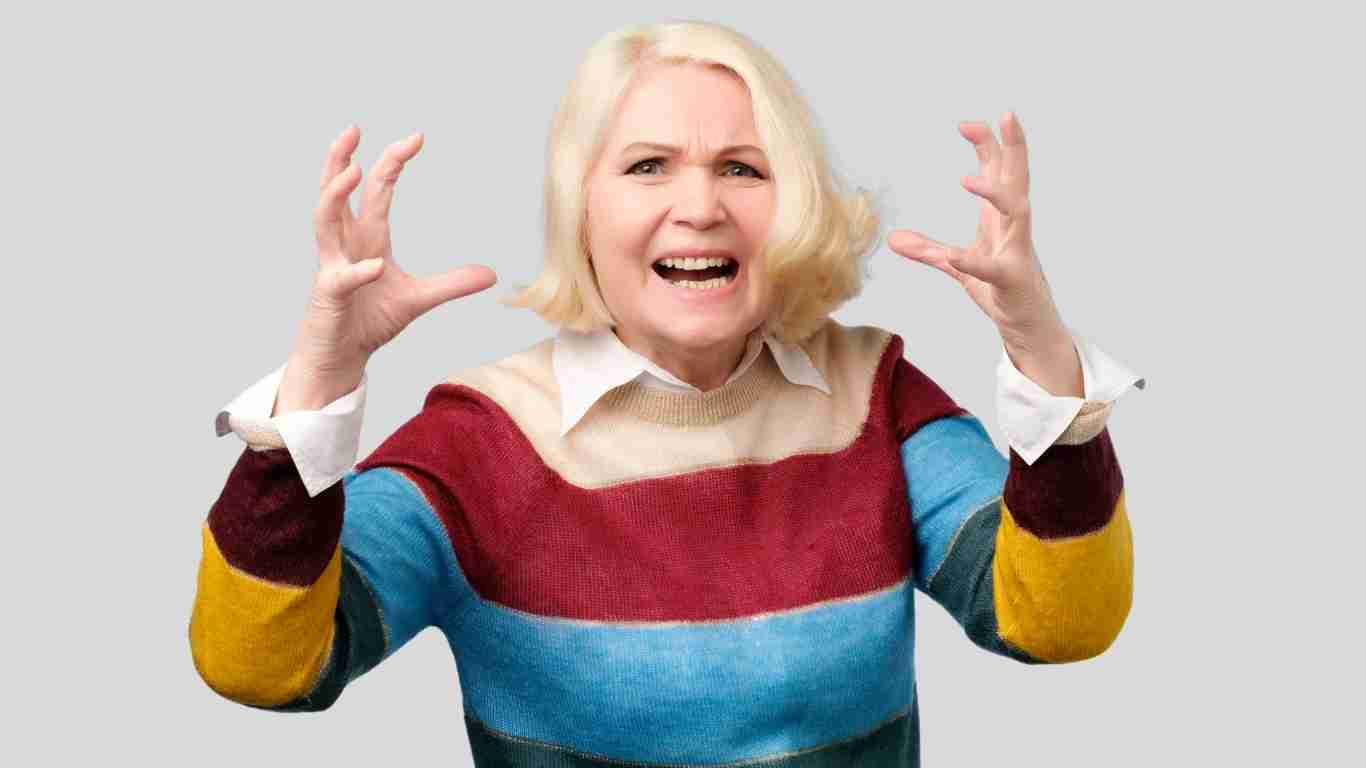 An angry old woman acting aggressively