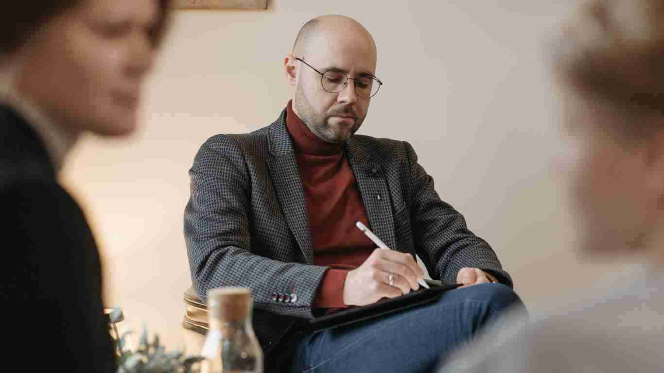A therapist helping a couple to communicate