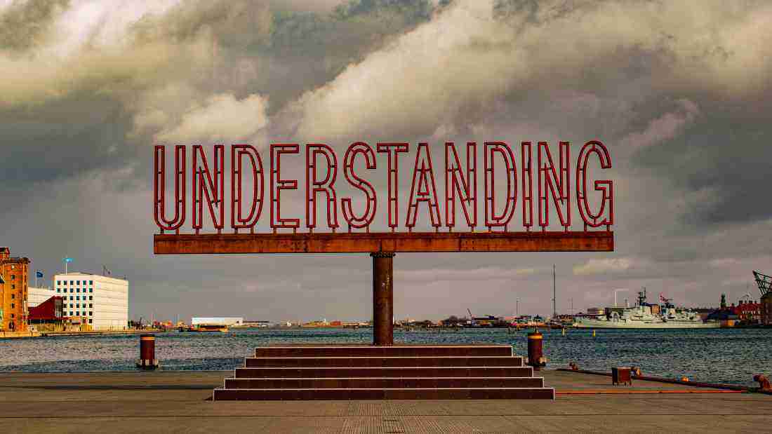 A sign that says UNDERSTANDING