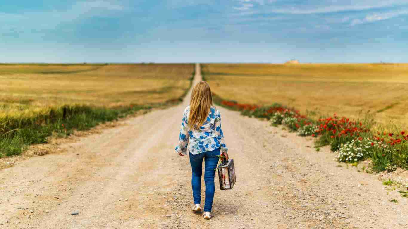 A woman walking away from the camera