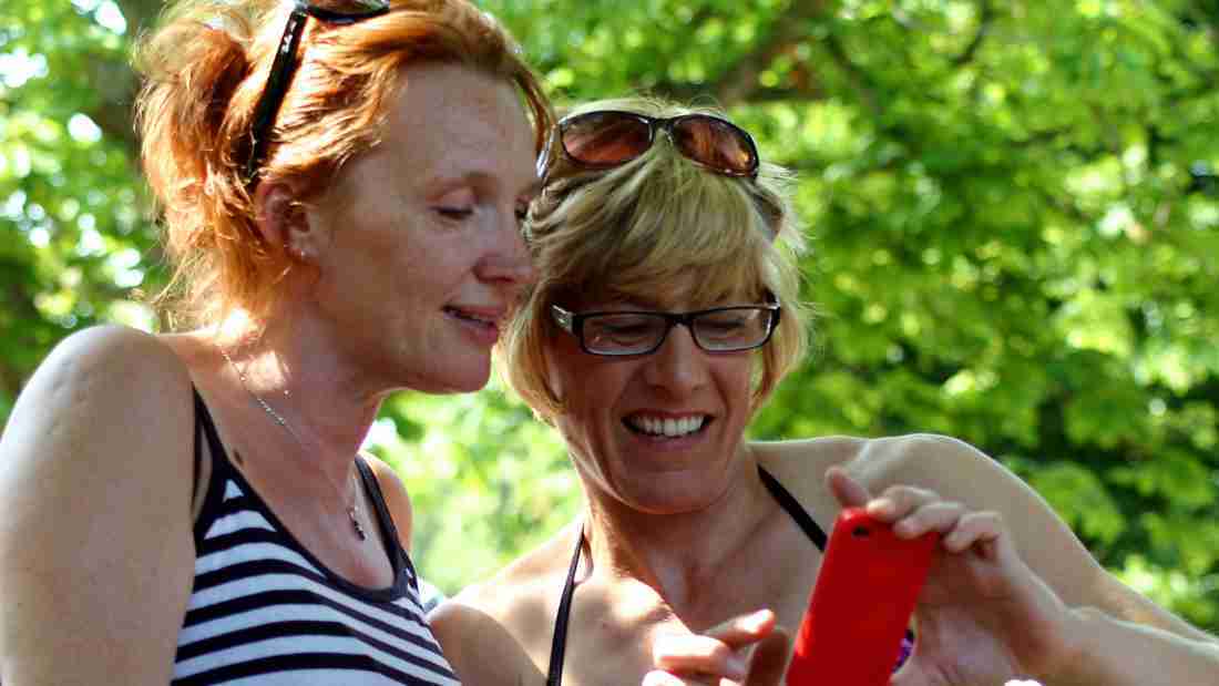 Two women gossiping