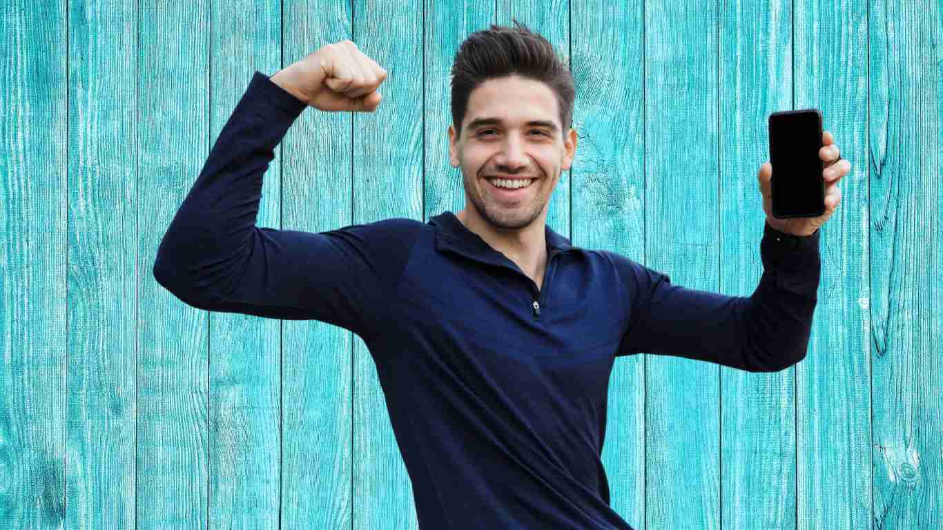 A young man showing off in front of the camera