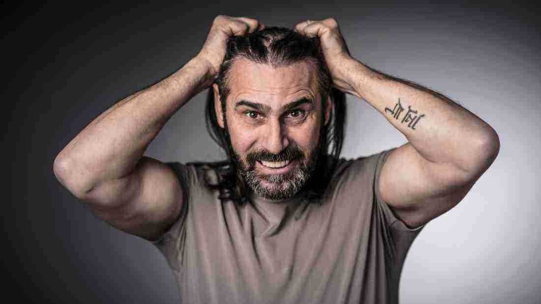 Man tearing his hair out