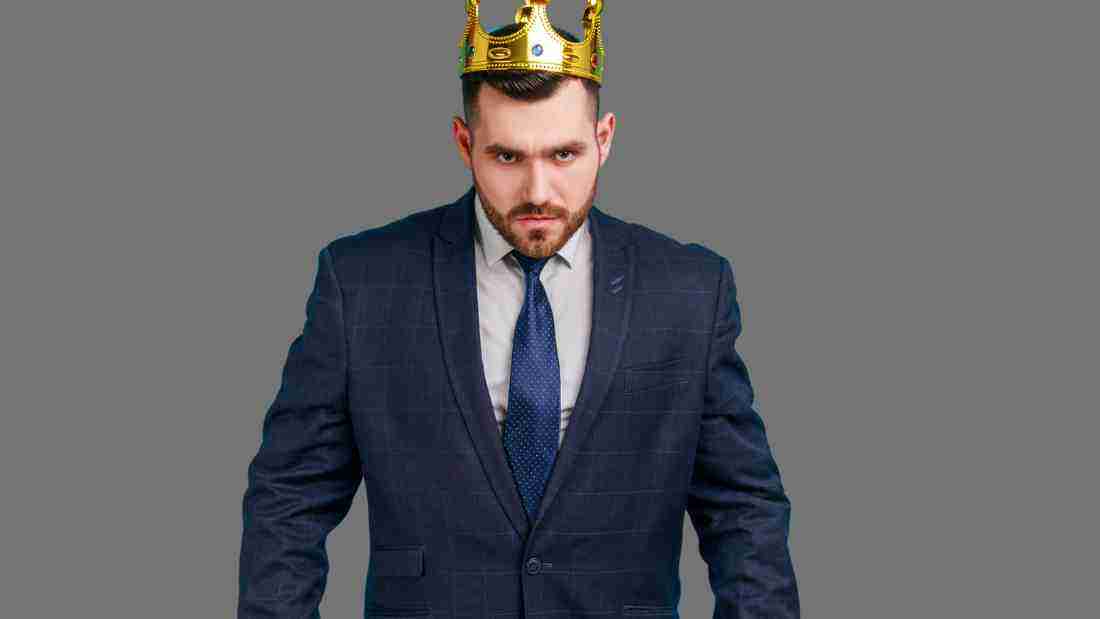 Narcissistic rage - a furious man wearing a crown