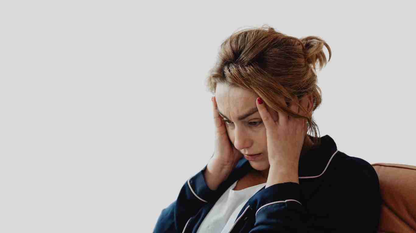 A woman who appears to be very confused and unhappy