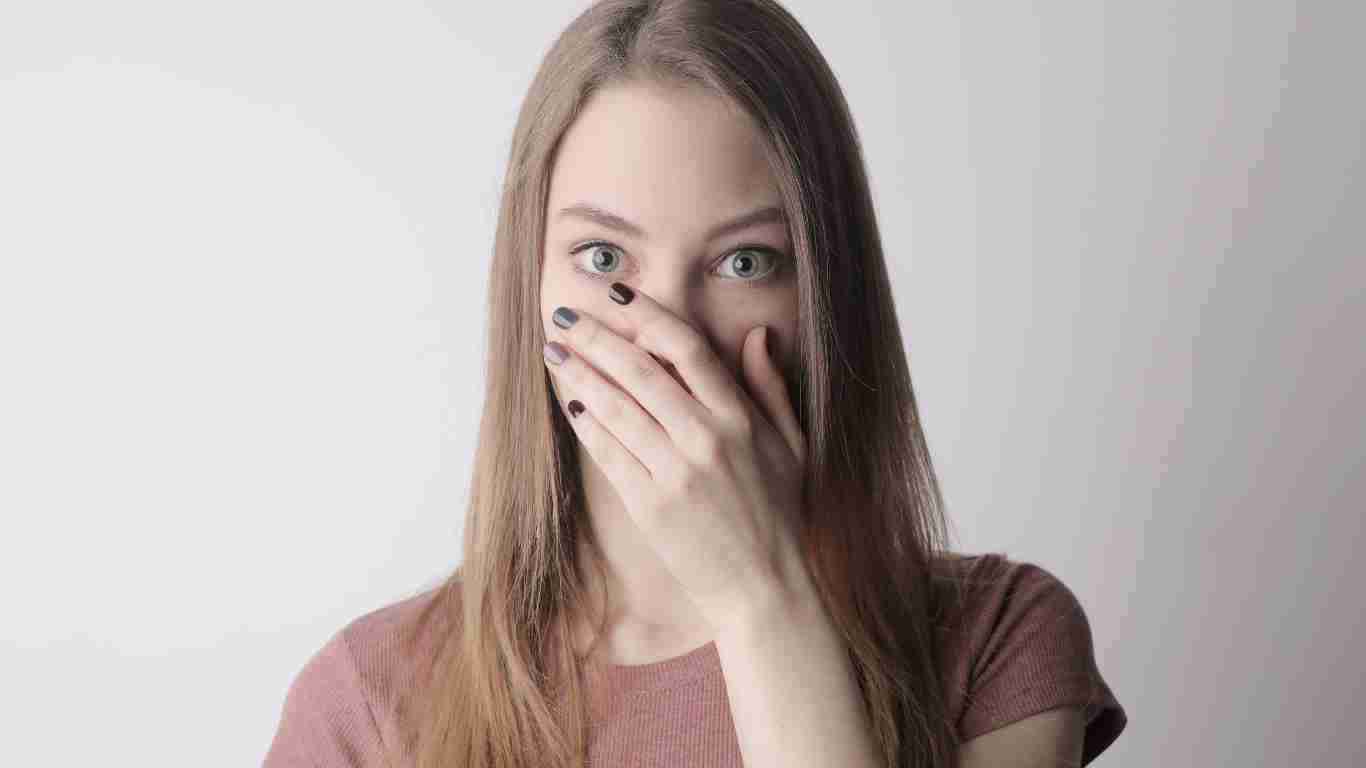 A woman who appears to be shocked and confused