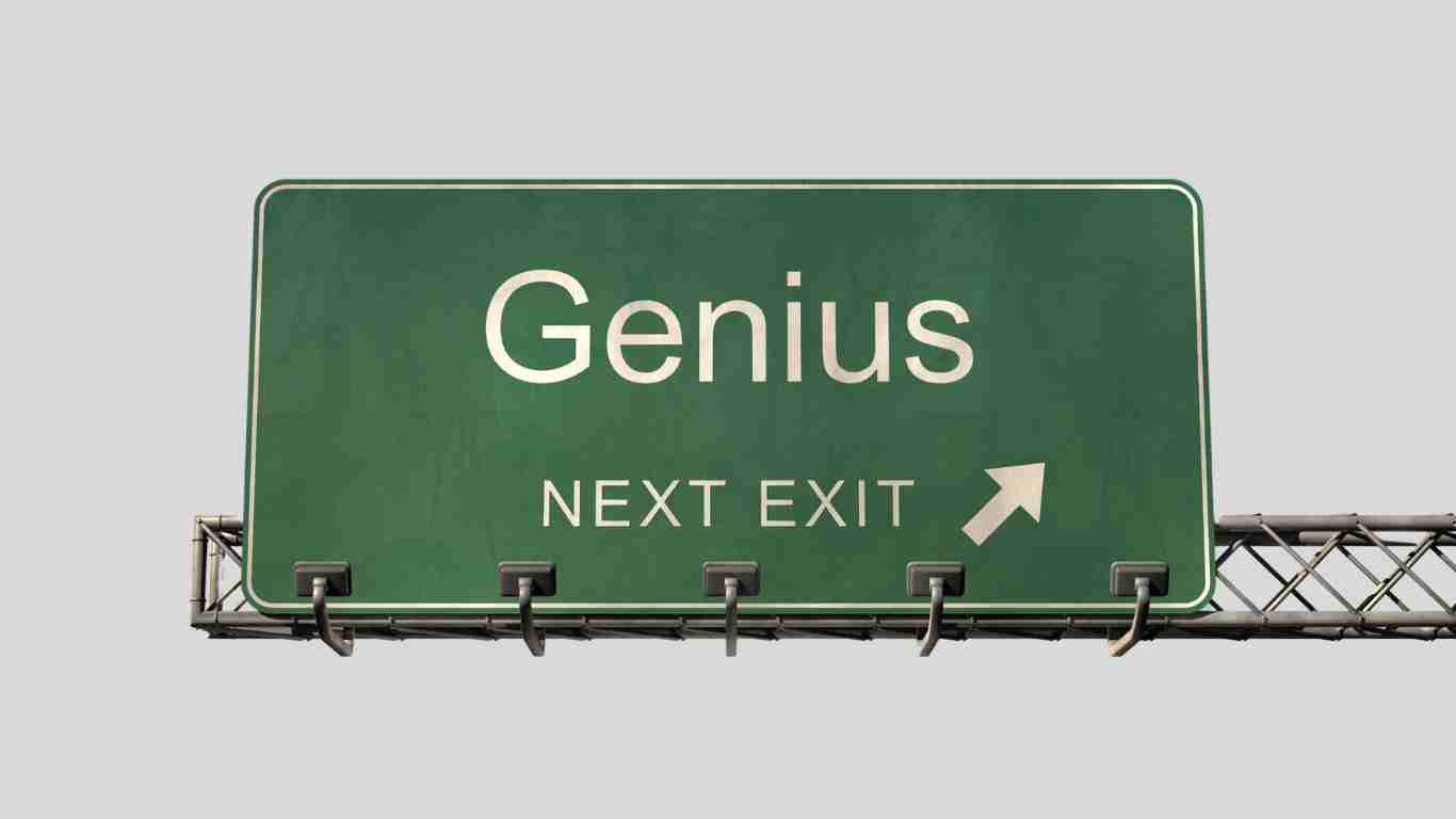 A billboard saying GENIUS NEXT EXIT