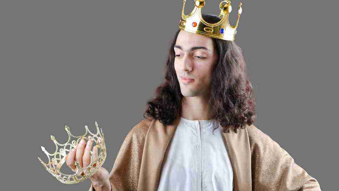 A man wearing a crown, symbolizing his need to always be in the spotlight