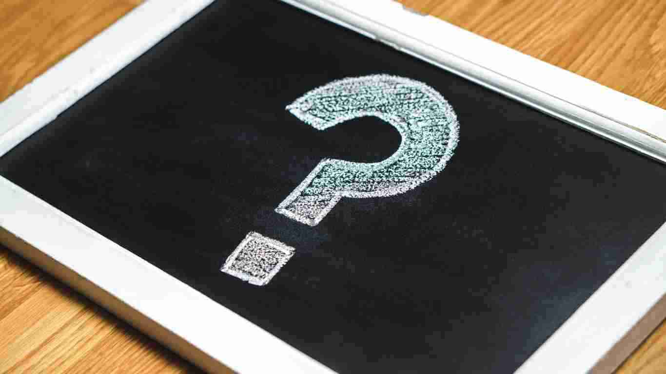 A question mark drawn on a chalkboard