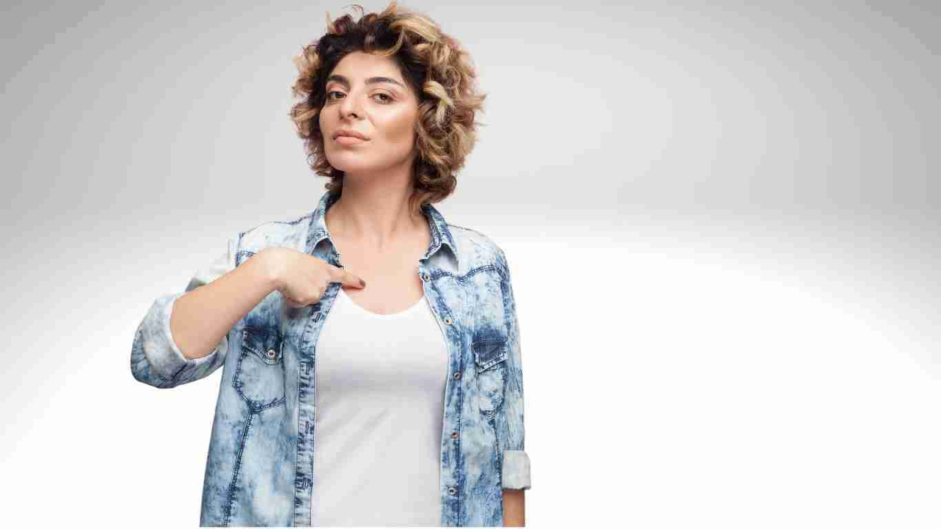 A self-centred woman pointing to herself