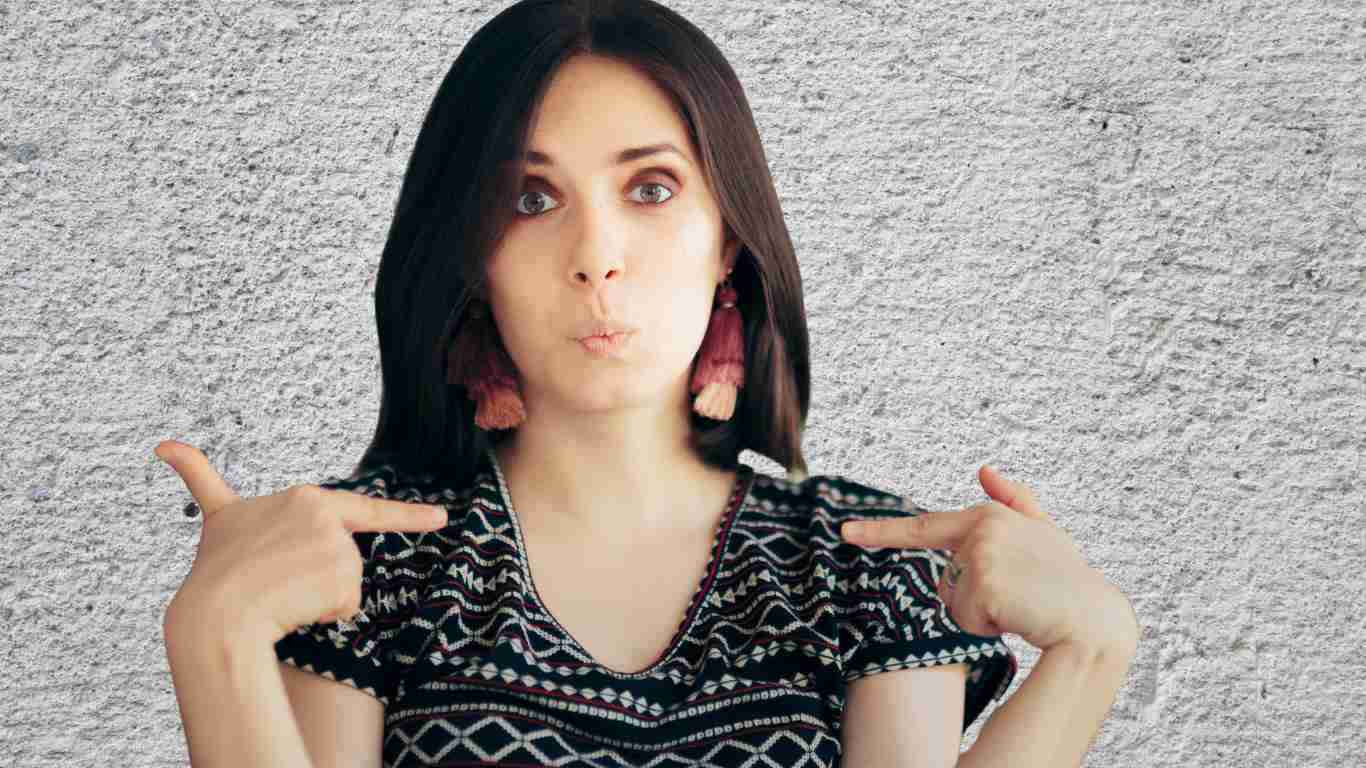 A self-centred woman pointing to herself