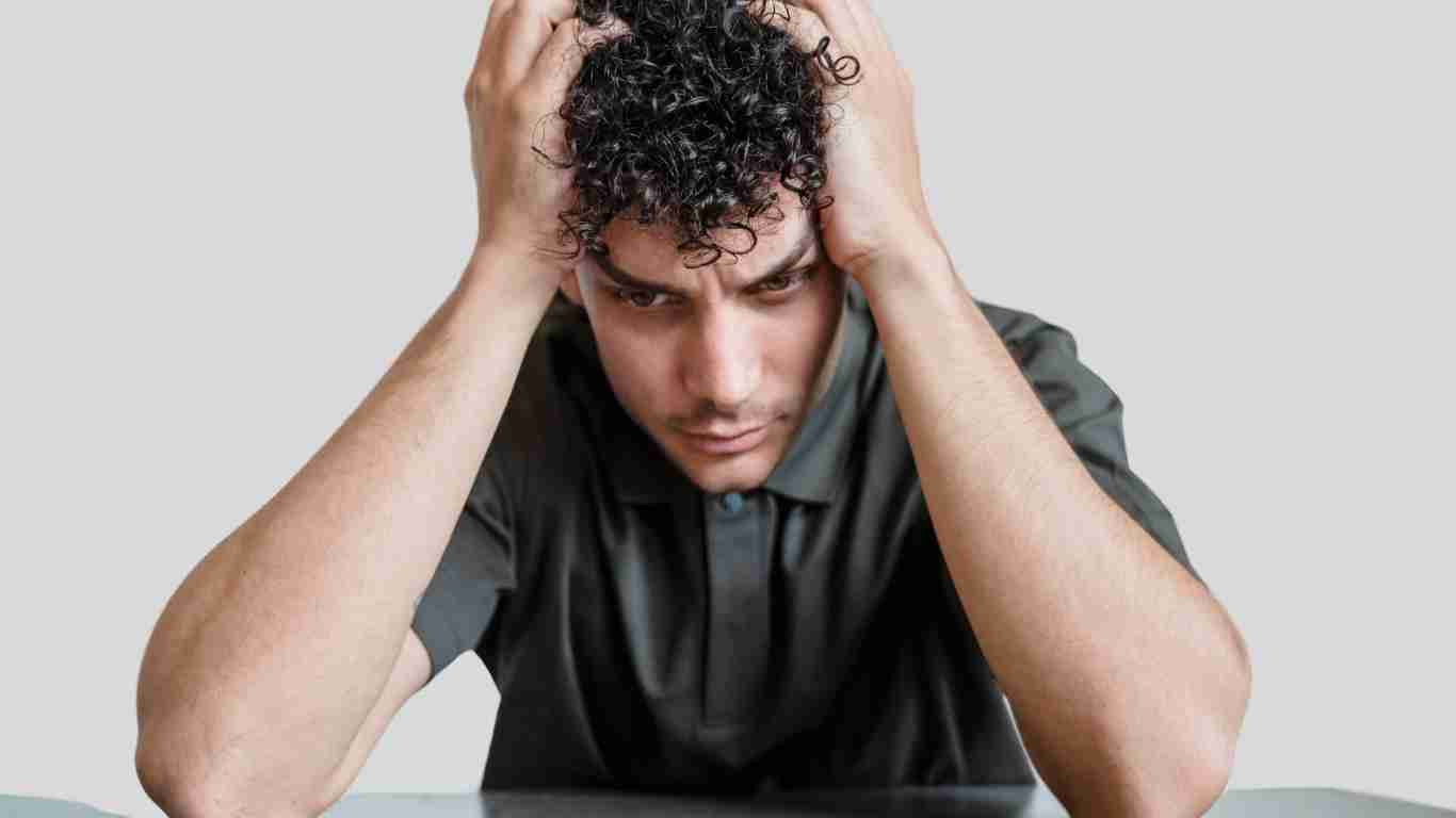 A man who appears to be totally confused and stressed out