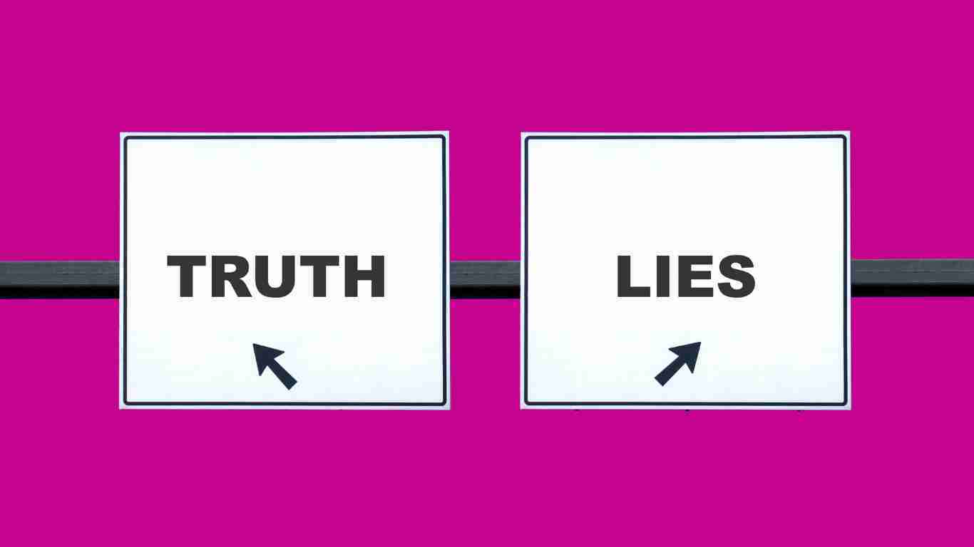 Road signs pointing to truth as opposed to lies
