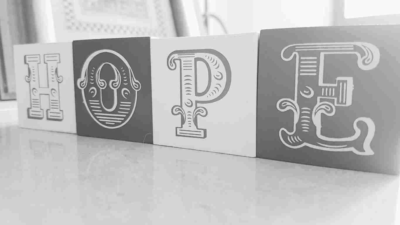 Wooden blocks spelling the word HOPE