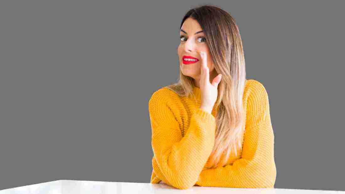 A malicious woman spreading gossip