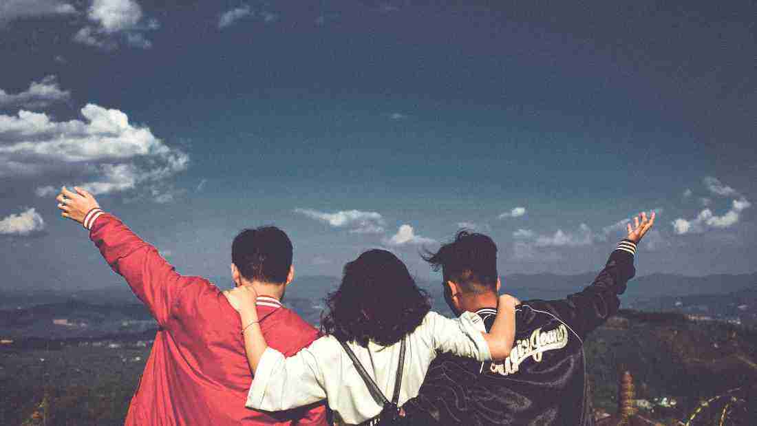 Three friends celebrating together