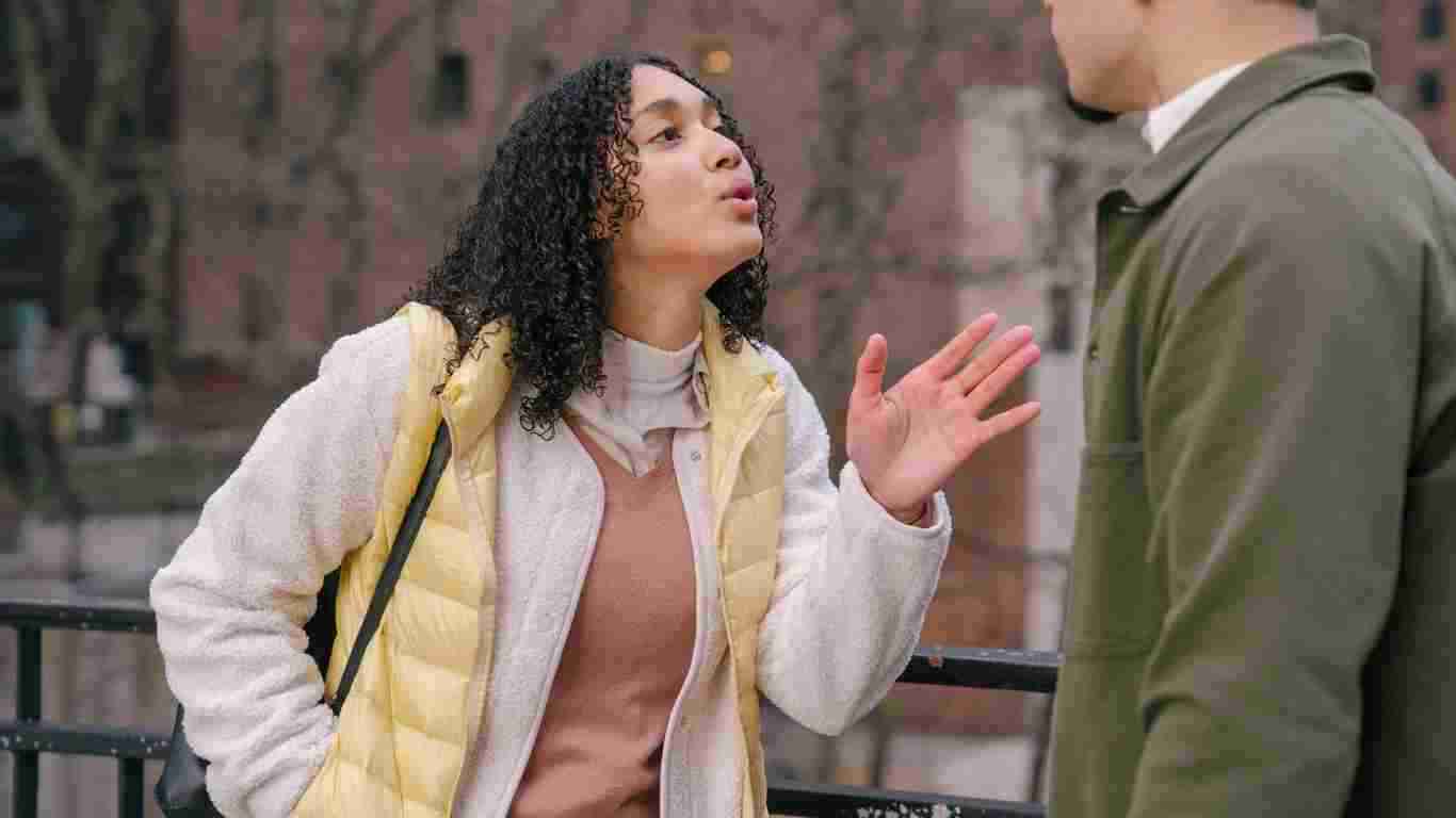 A woman verbally abusing her partner
