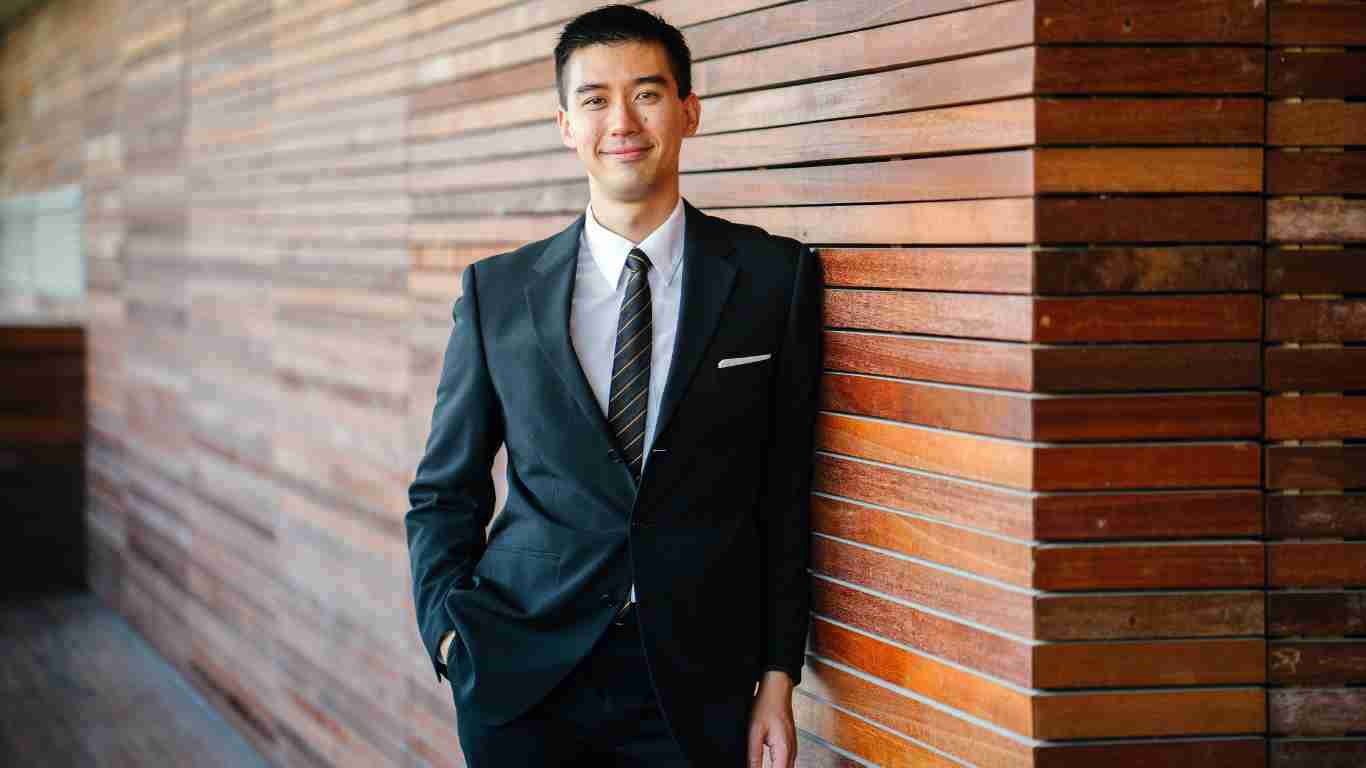 A businessman posing confidently for the camera