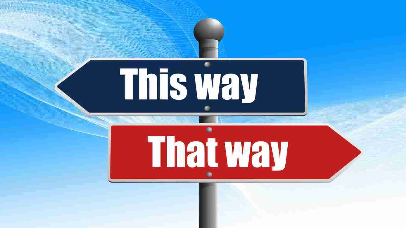 Road signs pointing in opposite directions