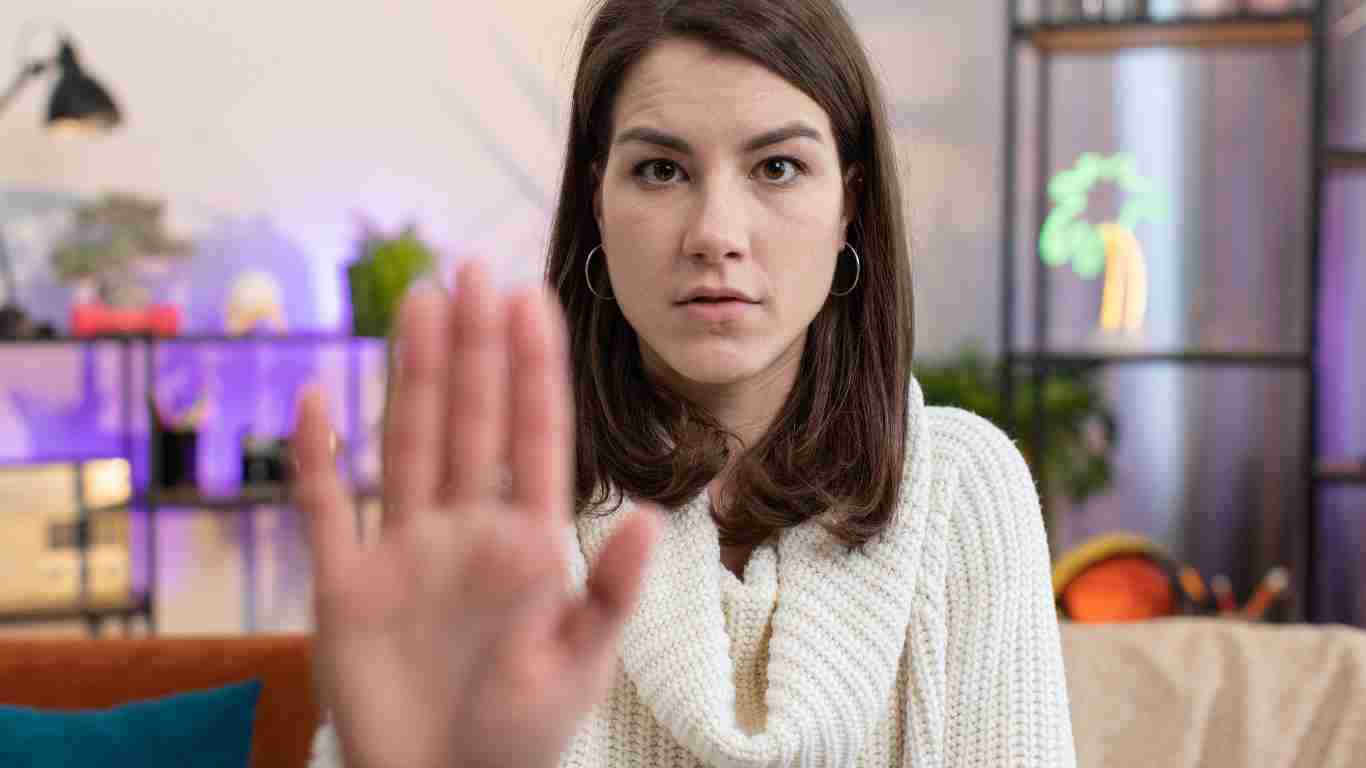 A young woman saying NO
