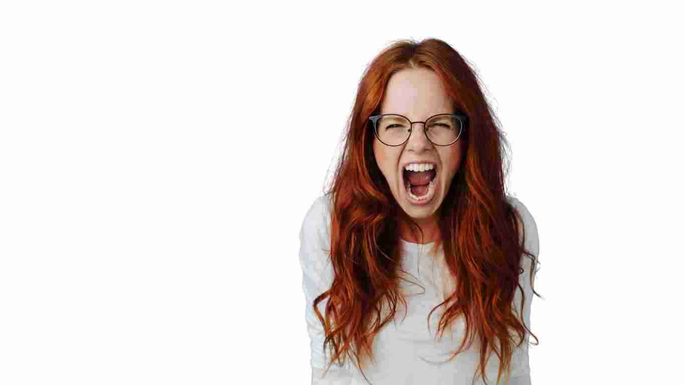 A very angry woman screaming with rage